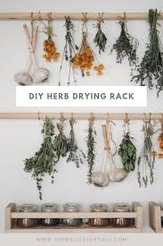 Not only does this laundry room folding station diy have plenty of storage for your laundry cart, but it features diy sweater drying rack drawers. Simple Diy Herb Drying Rack For Your Garden Herbs