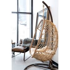 Belham Living Bali Resin Wicker Hanging Egg Chair With Cushion And Stand Hayneedle In 2020 Hanging Egg Chair Hanging Chair Egg Swing Chair