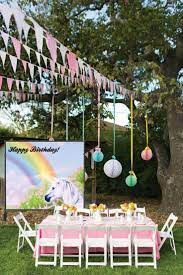 A wheelbarrow makes a great impromptu drink cooler. Unicorn Themed Backdrop Unicorn Themed Photo Backdrop Unicorn Birthday Party Decor Backyard Birthday Parties Backyard Birthday Backyard Party Decorations
