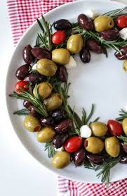 Make it a christmas party to remember! Olive Wreath Holiday Appetizer Holiday Appetizers Recipes Holiday Appetizers Christmas Recipes Appetizers