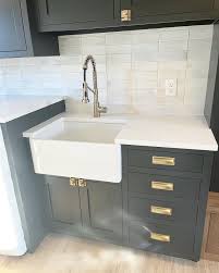Inset cabinet doors and drawers paired with @topknobs and stacked tile from  @thetileclub