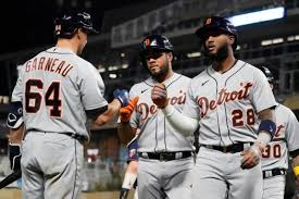 Miguel sano #22 of the minnesota twins celebrates his solo home run in the dugout against the detroit tigers in … Goodrum Tigers Defeat Twins 10 7 In Slugfest With 7 Homers The Oakland Press