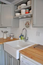 Like the combination of the light gray cabinets and wood floor. Beadboard Wallpaper Backsplash Group 48