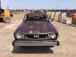 Image result for Herald Yellow 1975 Subaru