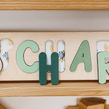 Custom made personalized wooden name puzzles for children, babies, or adults are a wonderfully unique gift that can include initials and symbols. Buy Neutral Dinosaur Name Puzzle Personalized Wood Name Puzzle With Pegs Custom Design Toddler Name Puzzle For Girls Boys Montessori Toys Nursery Decor Name Sign 1st Birthday