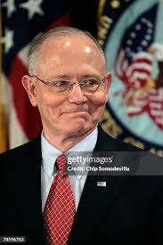 Secretary of Veterans Affairs James Peake shakes hands with his wife...  News Photo