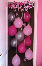 You can write some good messages on the bed, slip them into his wallet, send them on his phone, or make a poster and stick it on the wall. Birthday Morning Surprise Idea Hanging Balloons In Door Way And Birthday Banner Birthday Room Decorations Surprise 50th Birthday Party Birthday Decorations