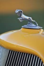 Hood Ornaments Emblems Of Pebble Beach Speedhunters Hood Ornaments Car Hood Ornaments Car Ornaments