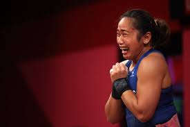 Hidilyn diaz of philippines celebrates as she competes and sets new world record and won the gold medal in the women's 55kg weightlifting event, at the 2020 summer olympics, monday, july 26, 2021. 9wnmc7vhci7zdm