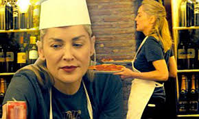 Stone baked pizza! Sharon cooks a tasty treat for her sons in a Rome  restaurant