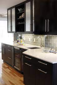 Installing black cabinets allows you to break from the comfort zone, creating a stronger look in a just like the white ones, black kitchen cabinets are perfect to be paired with various decorations. White Kitchen Cabinets With Black Hardware And Hinges Decorkeun
