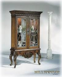 Ashley Millennium Casa Mollino Collection Curio Have It Love It It S One Of The Nicest Pieces In The Colle Ashley Furniture Cool Furniture Chair Decorations