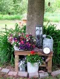 How To Create A Flea Market Garden Vignette Flea Market Gardening Garden Junk Creative Gardening
