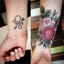 Turning the blotched out sun into a decorative flower beneath the dragonfly was a marvelous idea. Wrist Tattoo Cover Up Women Cover Up Tattoos For Women On Wrist In 2020