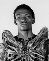 The Alien Revealed to Be Bolaji Badejo by Mike Sibthorp,