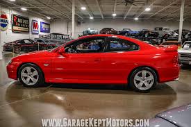 Image result for Red Brown 2004 Pontiac