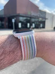 Press one of the buttons down and slide the corresponding watch band connector left or right. The New Nike Pride Sport Loop Looks So Clean On The Ceramic Watch Applewatch