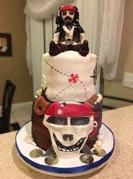 Pirates Of The Caribbean Cake With Chocolate Jack Sparrow Up Top
