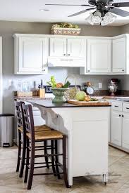 Remodelaholic How To Paint Your Kitchen Cabinets In One Weekend Painting Kitchen Cabinets Painting Kitchen Cabinets White Kitchen Paint