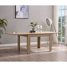 This modern dining table is made of engineered wood in a matte white finish. Capri Extending Dining Table