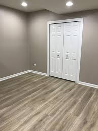 Though conventional laminate should be avoided in the basement, newer laminate products marketed as waterproof have entered the market and may be. Aquaguard Calico Water Resistant Laminate Floor Decor Living Room Design Modern House Flooring Basement Living Rooms
