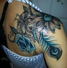 Seventh street tattoos & piercing in little rock, ar, has many experienced tattoo artists and piercers. Love The Blue In This Tattoo Shoulder Tattoos Ideas Flower Tattoos Tattoos Designs Tattoos Cool Shoulder Tattoos Shoulder Tattoos For Women