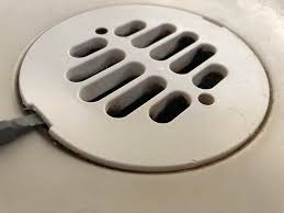 Use this diy guide to learn how to unclog a shower how to clear a shower drain with boiling water. How Do I Remove This Drain Cover To Clean The Gunk Out Of My Shower Drain Plumbing