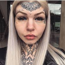 Black And White Womans Face Tattoo Design What Is The Difference Between Black Face Tattoo And Black And White Tattoo Tattoos Tattoos For Women Face Tattoos For Women Small Face Tattoos Facial Tattoos