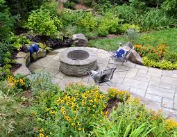 Stone Patio Fire Pit Wall And Garden Designed By Mary Kirk Menefee Installed By Merrifield Garden Center Patio Stones Garden Design Patio