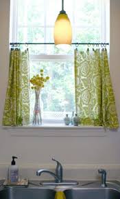 kitchen window curtains with light over