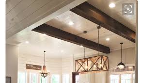 To Maintain Ceiling Height When Finishing Basement Stain Enclose Ceiling Beams Headers With Faux Beams And Shiplap Between Ceiling Beams Ceiling Height Beams