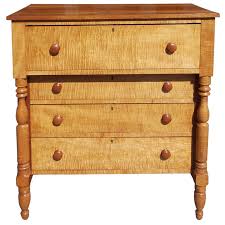 This picture is of an example in maple showing the shaped sides and fronts that form the handles that run up the sides. American Sheraton Tiger Maple And Cherry Chest Of Drawers Circa 1820 For Sale At 1stdibs