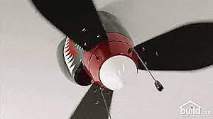 The light has a frosted glass dome covering which goes over the lightbulb to create a pleasant level of overhead light which is diffused throughout the room. World War Ii Tiger Shark Plane Ceiling Fan