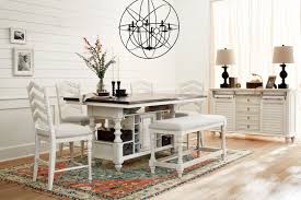 The Charleston Counter Height Dining Collection Farmhouse Living Channel The Serenity Of A Quaint Co Brown Dining Room Dining Table Height Dining Room Table