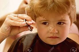 Semblable à boy hair salon. Rough Fringe Cut Little Child Given Haircut Small Child In Stock Photo Picture And Royalty Free Image Image 118683735