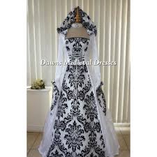 Recently, themed weddings are gaining increasing popularity. Medieval Gothic Pagan Hooded White Bold Black Wedding Dress Medieval Dresses And Gowns For Weddings Handfasting Ceremonies And Other Special Occasions
