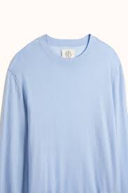 Donna karan car coat comes in double face wool felt with a pointed collar, slit pockets, and hidden placket button up front. Sky Blue Superfine Crew Neck Jumper
