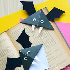 You can cut out a circle of paper and put yarn on it and glue it to the bottom of the trunk to make a tree skirt. Halloween Origami For Kids Easy Peasy And Fun