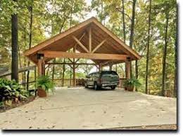 Wooden Carports Timber Framed Carport With Queen Post Truss We Need This For Our Camper Carport Plans Carport Carport Makeover
