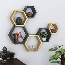 One hexagon (seen elsewhere on the homepage) costs 35 but buy them in a group of t… Set Of 6 Decorative Hexagon Wall Shelves Golden Black