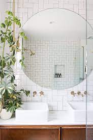 We'll discuss installation considerations below, but be aware that the bigger and heavier your wall mirror, the most important it is round mirrors are also a popular form to use when creating a mosaic or tiled look in a bathroom. 17 Incredibly Cool Bathrooms For Every Style Amazing Bathrooms Round Mirror Bathroom Bathroom Decor