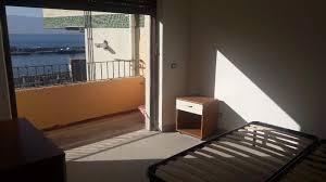 Casa singola, indipendente, libera su tre lati, su due livelli composta da due appartamenti separati in località bocale ii accanto pizzeria calipso, sulla spiaggia; Reggio Calabria Panoramico Bilocale A Reggio Di Calabria In Affitto