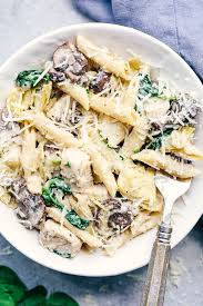 One Pot Creamy Spinach Mushroom Artichoke Chicken In Bowl Would Be Nice To Add In Crispy Bacon Artichoke Chicken Creamy Spinach Chicken Spinach Recipes