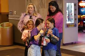 Swifties swiftly fill theaters to see Taylor Swift's “Eras” concert film