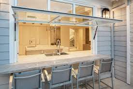 Top area is a talk through window, can be ordered with. Pass Through Awning Windows Ideas Photos Houzz