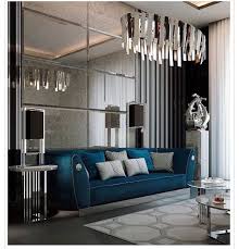Mirror Tiled Wall Designs Hanging Chandelier Navy Blue Velvet Sofa In 2020 Accent Walls In Living Room Living Room Decor Inspiration Dream Living Rooms