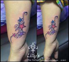 Stars Tattoo Amazing Stars Tattoo Colored Stars Tattoo On Hand Tattoo Girl Tattoo Lillysfinetattoo Star Tattoo On Hand Star Tattoos Feather Tattoos