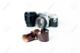 Vintage gömlek, aksesuar, elbise ya da ayakkabı. Carrete De Fotos Analogica Con Camara Vintage Y Una Lente De Foco En El Fondo En Blanco Fotos Retratos Imagenes Y Fotografia De Archivo Libres De Derecho Image 35034859