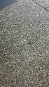 Driveway border stone driveway gravel driveway gravel path driveway landscaping pea gravel driveway ideas circle driveway tar and chip cobble stone driveway design in new york. How To Fix A Cracked Pea Gravel Pool Deck Pea Gravel Pea Gravel Patio Pebble Patio