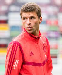 After only two international caps, coming on as a substitute, thomas returned from south africa as the top goal scorer, the best young player in the. Thomas Muller Wikipedia